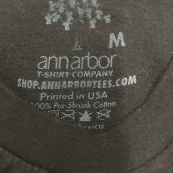 Woman’s Classic Black Tee with Bold White and Green Text Size M - Picture 5 of 5